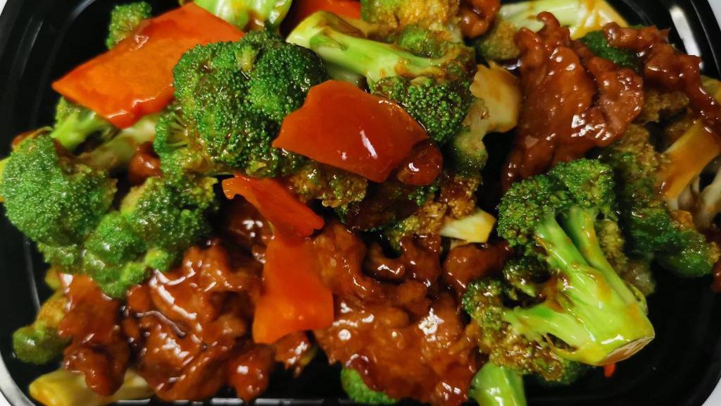 Broccoli Beef · Stir-fried beef with fresh crisp broccoli florets and carrots, in our brown sauce.