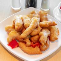 Sweet & Sour Chicken · Crispy chicken pieces served with pineapple, bell peppers, carrots and onions in our chef's ...