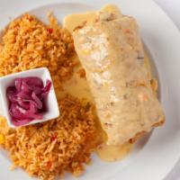 Mesa Chimichanga · Seasoned beef or shredded chicken, stuffed into a flour tortilla with onions, peppers, and c...