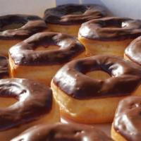 Dozen Chocolate Glazed · One dozen of chocolate glazed donuts.