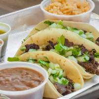 Street Tacos · Flour, Corn Or Crunchy Tortillas Topped With Your Choice Of Toppings
