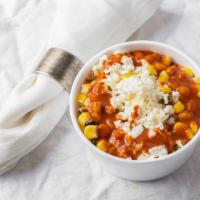 Chimayo Market Corn · Fresh Roasted Corn Topped with Queso Fresco, Chipotle Sour Cream, & Salsa Valentina