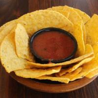 Chips And Salsa · Four-ounce bowl with choice of roasted salsa or salsa verde.