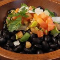 Beans · Eight-ounce bowl with choice of refried or black beans.
