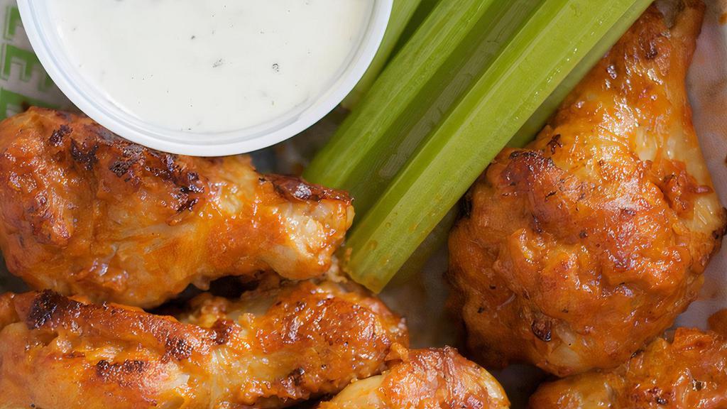 Hot Wings · Bon-in or boneless. 8 wings with ranch or blue cheese.