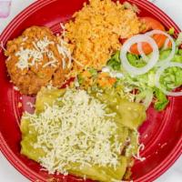 Enchilada Plate · 3 red or green enchiladas, rice and beans.