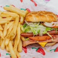 Monster Burger · Beef patty, ham, bologna, turkey, winnie, aguacate and veggies.