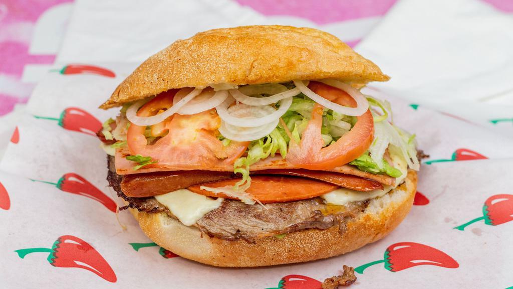 Torta Monstro · Ham, bologna, winnie, turkey, milanesa, aguacate, mayo and veggies. Add fries and a drink to any of your tortas for an additional price.