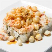 Scallop Volcano Roll · Inside: California Roll. Top: Baked Crab Meat, Fried Baby Scallop, Crunch. Sauce: Spicy Mayo...
