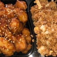 Sesame Chicken · Tender lightly battered crispy chicken sauteed in the chef's special brown sauce with steame...