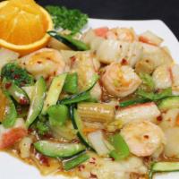 Seafood Delight · Assorted seafood, scallops, fish, shrimp, imitation crab, carrots, mushrooms, baby corn, wat...