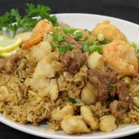 Combination Fried Rice · Dinner-sized serving. Chicken, beef and shrimp.
