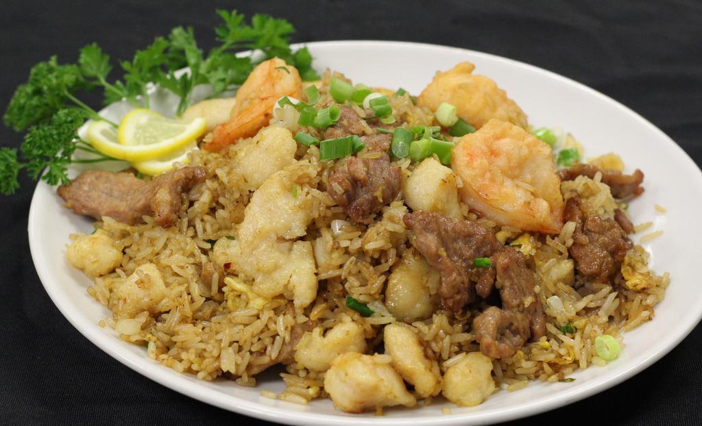 Combination Fried Rice · Dinner-sized serving. Chicken, beef and shrimp.