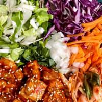 Signature Bowl · Includes black beans, grilled corn, lettuce mix, carrot, red cabbage, kimchi, lime juice, on...