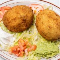 Stuffed Avocado · Two large breaded avocados stuffed with beef or chicken fajita served with sour cream and gu...
