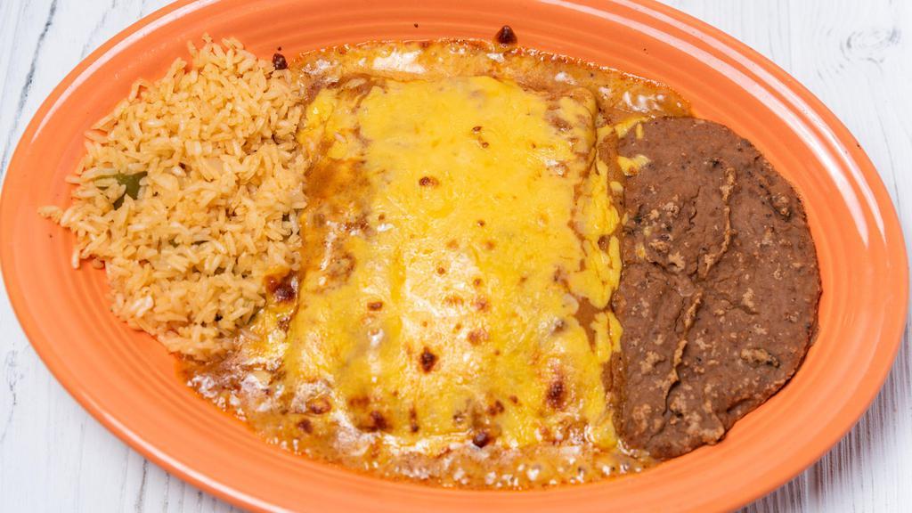 Cheese Enchilada · Three cheese enchiladas covered with gravy and cheese served with rice and beans.