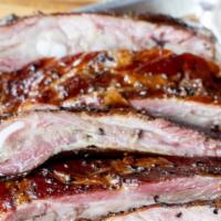Pork Spare Ribs · Meaty pork ribs simply seasoned and smoked low and slow with local post oak wood. One pound ...