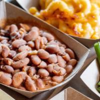 Norma Jean’S Pinto Beans · Our Savory Pinto beans are made from scratch everyday based on 2nd Generation Pitmaster Norm...