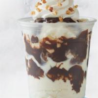 Regular Sundae · Vanilla ice cream topped with hot fudge, whipped topping, peanuts, and cherry.