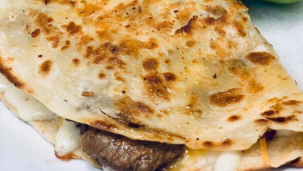 Quesadillas · A fresh flour tortilla, filled with Asadero and Colby Jack cheeses, grilled to a nice crust.  Served with Jalapeño Ranch.