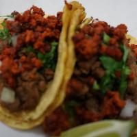 Campechanos Tacos · The meat of your choice, cilantro and onions (unless you tell us to hold’em), topped with ho...