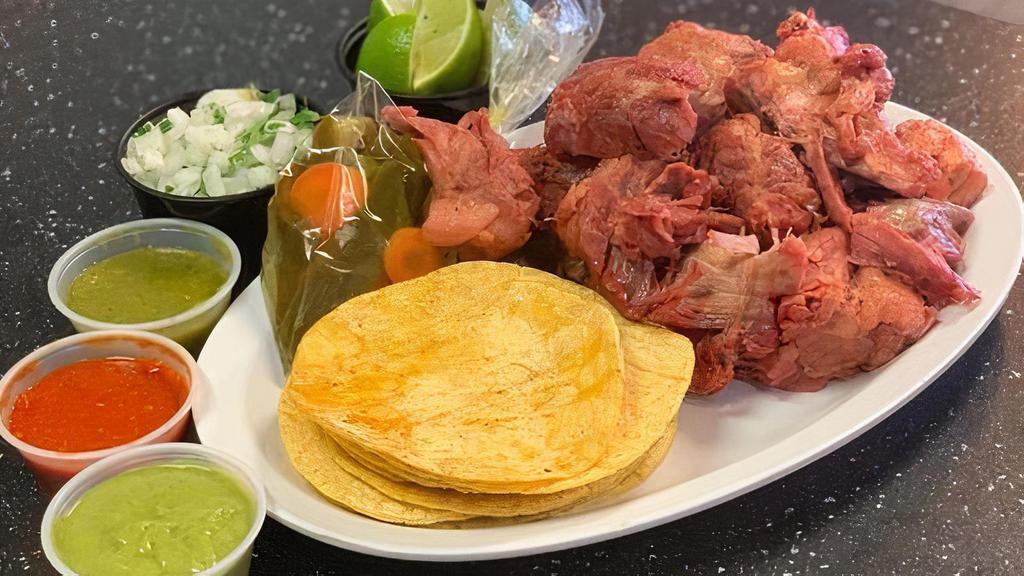 Carnitas · A delicious 1lb (one pound) of slow simmered pork for 5 hours. includes: cilantro onions 2 types salsa grilled onions tortillas and limes.