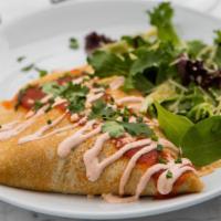 Chicken Enchilada · grilled chicken, refried beans, topped with crema, queso fresco, cilantro, & chipotle sauce