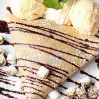 S'Mores Crêpe · nutella, torched marshmallows, graham crackers, & semi-sweet chocolate drizzle