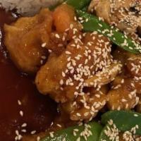Sesame Chicken · Spicy. Deep fried crispy chicken with sesame and vegetables stir fried with chef's special s...