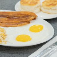 The Traditional · Two eggs any style with choice of applewood smoked bacon, sausage patties or grilled ham.