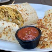 Breakfast Burrito · Your choice of one: ham, bacon, sausage or chorizo with onion, peppers, jalapeños and chedda...