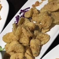 Fried Pickles · Lightly fried served with a side of ranch