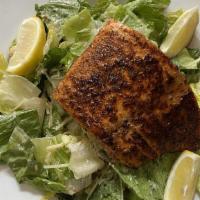 Grilled Chicken Caesar · A bed of crisp romaine lettuce topped with sliced, grilled chicken breast and tossed in our ...