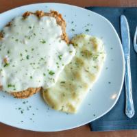 Chicken Fried Steak · A Texas favorite, a tender beef cutlet battered and deep fried, smothered in country gravy a...