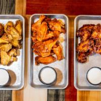 Spot Wings · Island famous wings in your favorite flavor.  Served with a side of ranch.