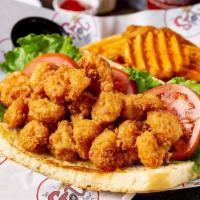 Uncle Bill'S Famous Shrimp Po-Boy · Locally sourced. Lightly fried Gulf shrimp served on our house-made po-boy bun with shredded...