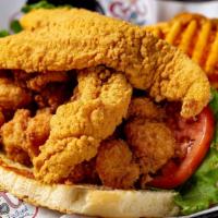 Shrimp & Fish Po-Boy · Locally sourced. Fried shrimp and fish served on our house-made po-boy bun with shredded let...