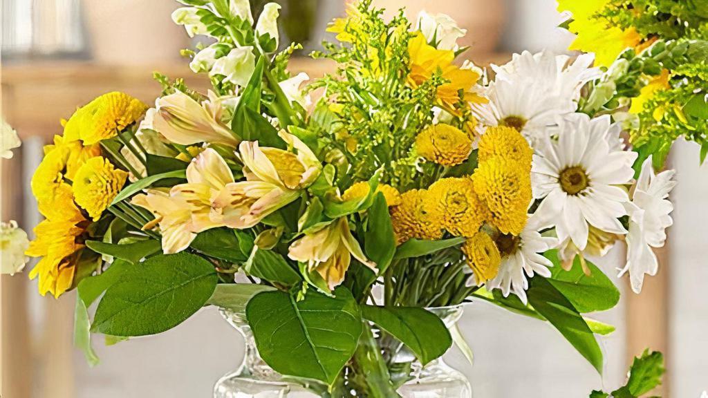 Rustic Wildflower Florist Original · When you give someone the Rustic Wildflower Florist Original Bouquet, you’re giving the gift of joy.  This bright and colorful arrangement is sure to bring a smile. Vase included. Please Note: The colors or floral varieties used in this bouquet will vary based on freshness and availability. A local florist will expertly craft a one of a kind arrangement using the finest quality flowers. The actual design you or your recipient will receive will be different from the image shown here.  Item # W-6022