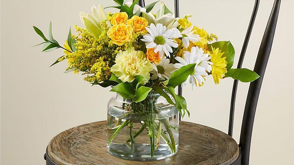 Lemonade · Send the Lemonade Bouquet to celebrate mom on her special day, spring and summer birthdays, or to cheer up a loved one's day. Bright stems like carnations, daisies and roses bloom in joyful, energetic yellows like everyone's favorite citrus refresher. Vase included. Please Note: The bouquet pictured reflects our original design for this product. While we always try to follow the color palette, we may replace stems to deliver the freshest bouquet possible. Item #M5S