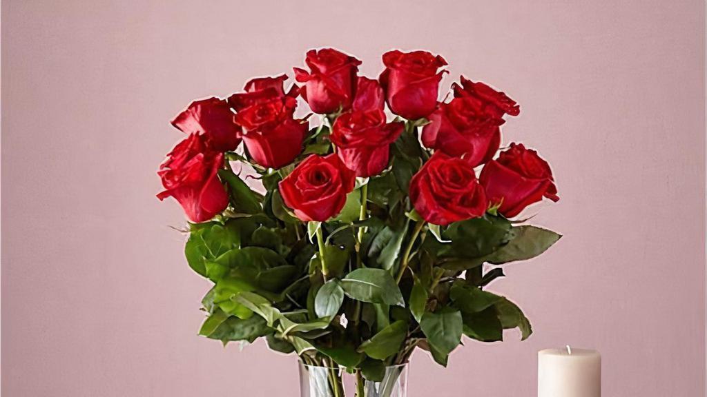 18 Long Stem Red Roses · This classic Long Stem Red Rose Bouquet is a powerful symbol of passion or gratitude for anyone special in your life. One of the most iconic flowers of all, your recipient will feel nothing but love when these stunning roses arrive. Vase included. Item # B59D