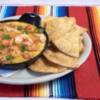 New Shrimp, Crawfish & Shrimp Dip · Shrimp, crawfish, spinach, mixed cheese baked in a skillet and topped with diced tomatoes, g...