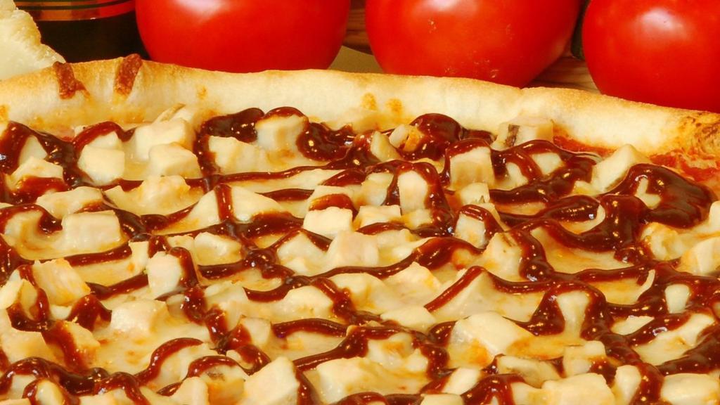 Bbq Chicken Pizza Slice · Always room for mo' chicken. Chunks of chicken generously spread over our 100% mozzarella cheese and generously topped with our time-tested BBQ sauce, and sliced red onions.