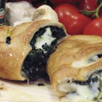 Spinach Stromboli · Traditional hand-rolled fresh dough stuffed with fresh spinach, 100% whole milk mozzarella c...