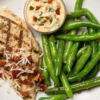 Herb Chicken With Mediterranean Sauce & Green Beans · Marinated, herby chicken breast paired with our Snap-famous garlicky green beans, plus a hou...
