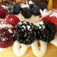 Cream Cheese & Mixed Berry Donut · Glazed donut with cream cheese and fresh mixed berries.