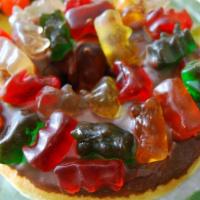 Gummy Bear Topped Donut · Donut with chocolate icing and gummy bears on top.