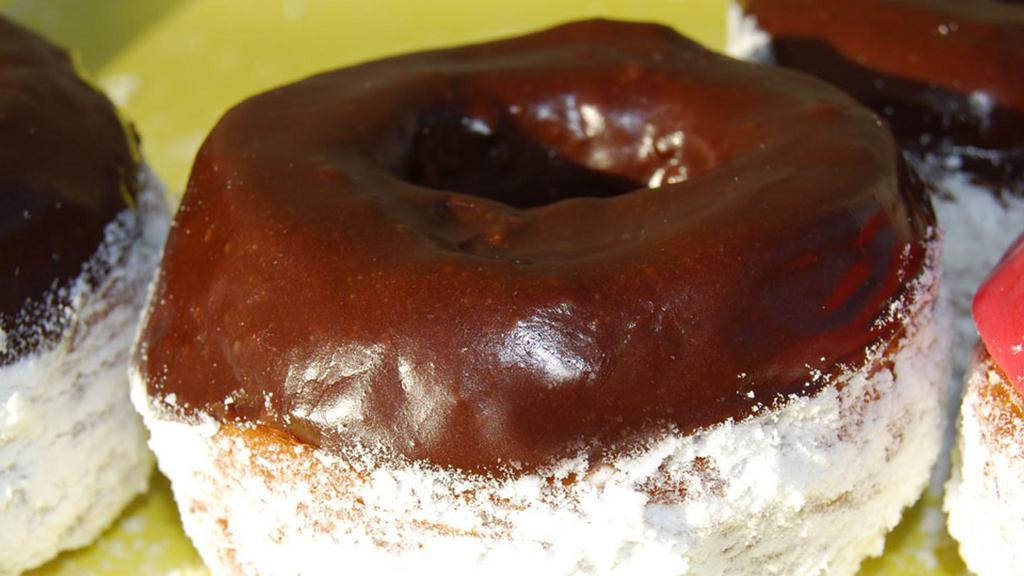 Chocolate Croissant Donut · Chocolate topped croissant donuts. A hybrid of croissant and donut.