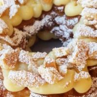 Banana Pudding Funnel Donut · Funnel Donut with Banana Pudding, Fresh Bananas & Crushed Wafer cookies