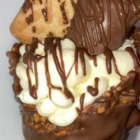 2 Butterfinger Stuffed Cheesecake Cone  · 2 Waffle cone fulled with cheesecake