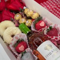 Stell Rosa Box · STRAWBERRYS
PINEAPPLES
CHOCOLATES
PRETZELS
ROSES & WINE